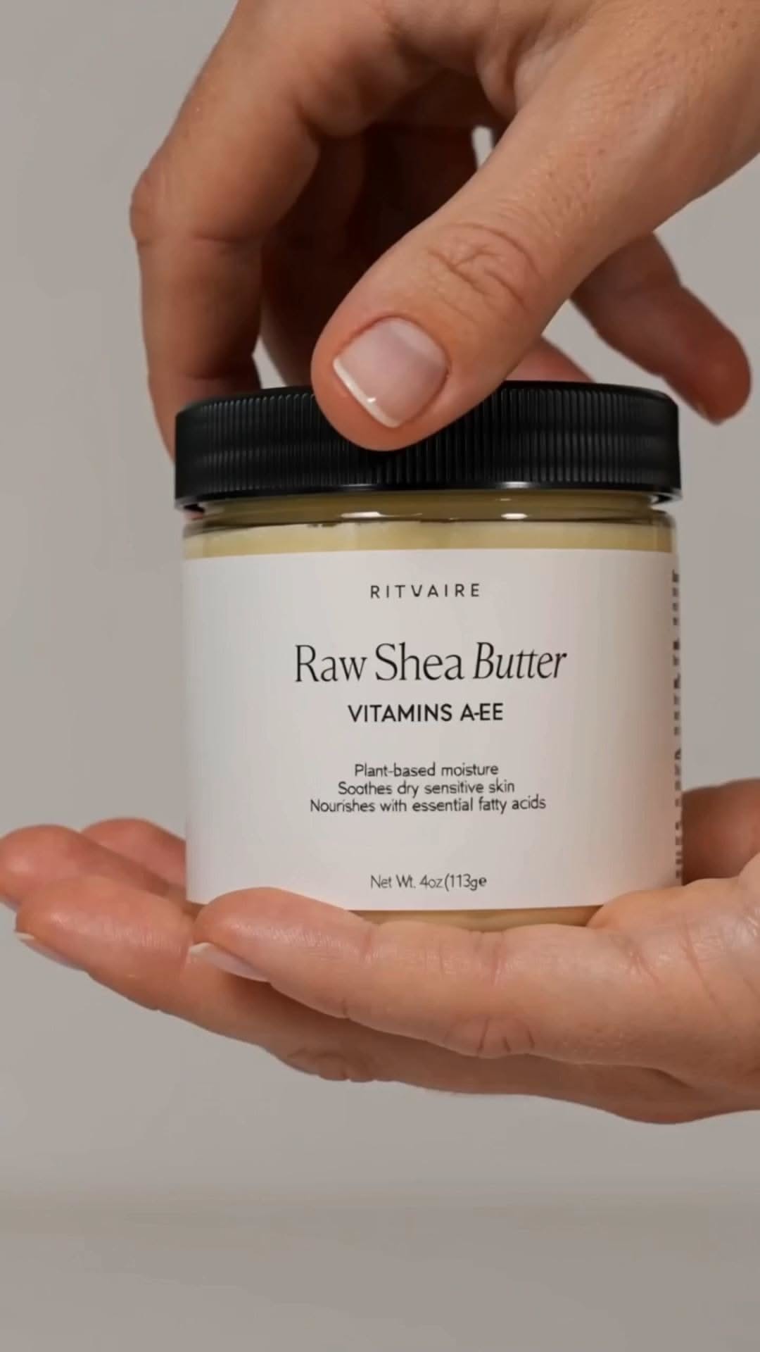 After the Ritual — Raw Shea Butter jar held in hand