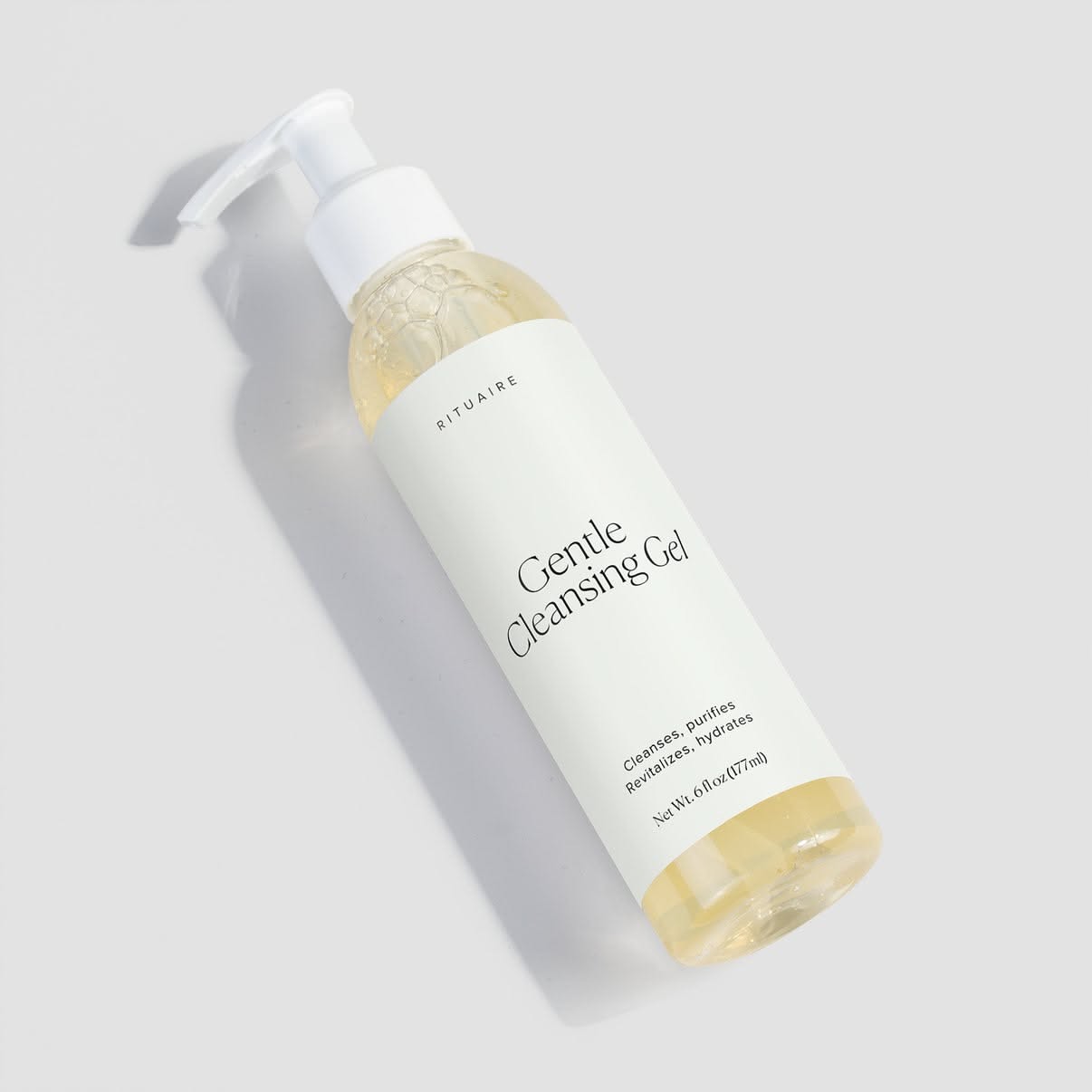 Rituaire Gentle Cleansing Gel — diagonal composition with hard shadow